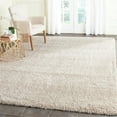 thumbnail image 1 of SAFAVIEH Santa Monica Chelsey Solid Shag Area Rug, Beige, 9'6" x 13', 1 of 8