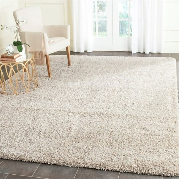 SAFAVIEH Santa Monica Chelsey Solid Shag Area Rug, Beige, 9'6" x 13'
