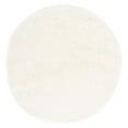 thumbnail image 1 of SAFAVIEH Santa Monica Chelsey Solid Shag Area Rug, Ivory, 6'7" x 6'7" Round, 1 of 7
