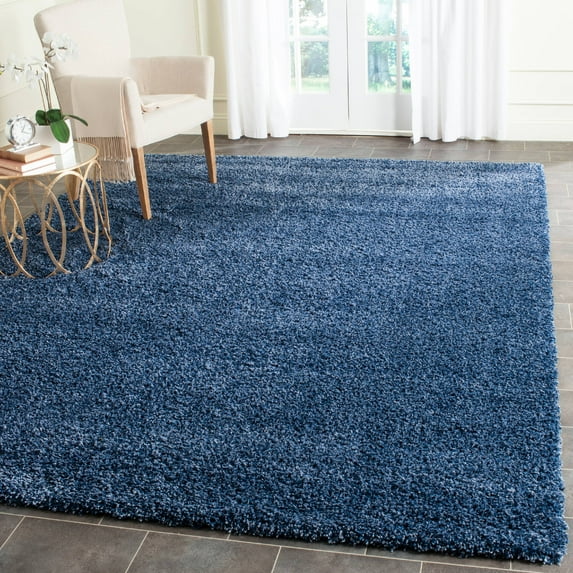 SAFAVIEH Santa Monica Chelsey Solid Shag Area Rug, Navy, 8' x 10'