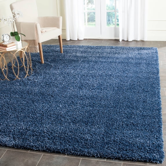 SAFAVIEH Santa Monica Chelsey Solid Shag Area Rug, Navy, 9'6" x 13'