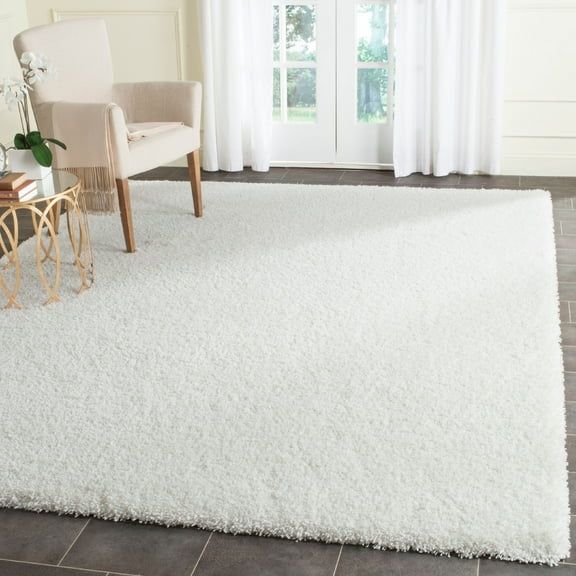 SAFAVIEH Santa Monica Chelsey Solid Shag Area Rug, White, 9' x 12'