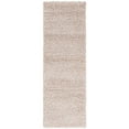 thumbnail image 1 of SAFAVIEH Santa Monica Chelsey Solid Shag Runner Rug, Beige, 2'3" x 11', 1 of 7