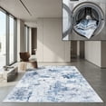 thumbnail image 1 of SAFAVIEH Santa Monica Jessy Abstract Machine Washable Area Rug, Ivory/Blue, 5' x 8', 1 of 13