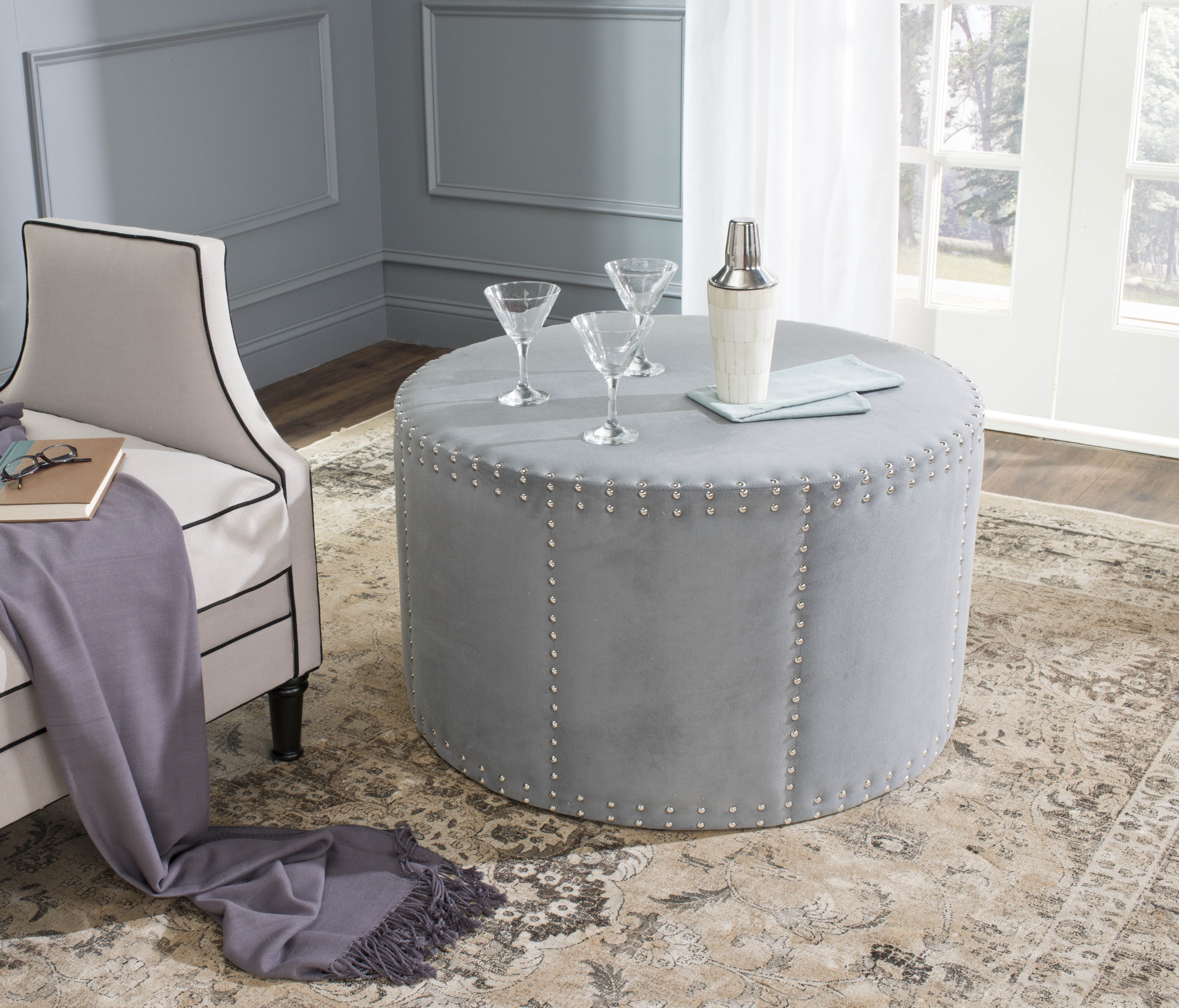 Transitional 34'' Gray Velvet Round Cocktail Ottoman with Nailhead Trim
