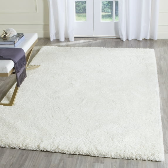 SAFAVIEH Ultimate Atanas Solid Plush Polyester Shag Area Rug, Ivory, 5' x 8'