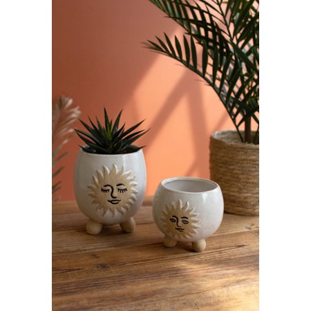 SET OF TWO CERAMIC SUN FACE PLANTERS WITH BALL FEET