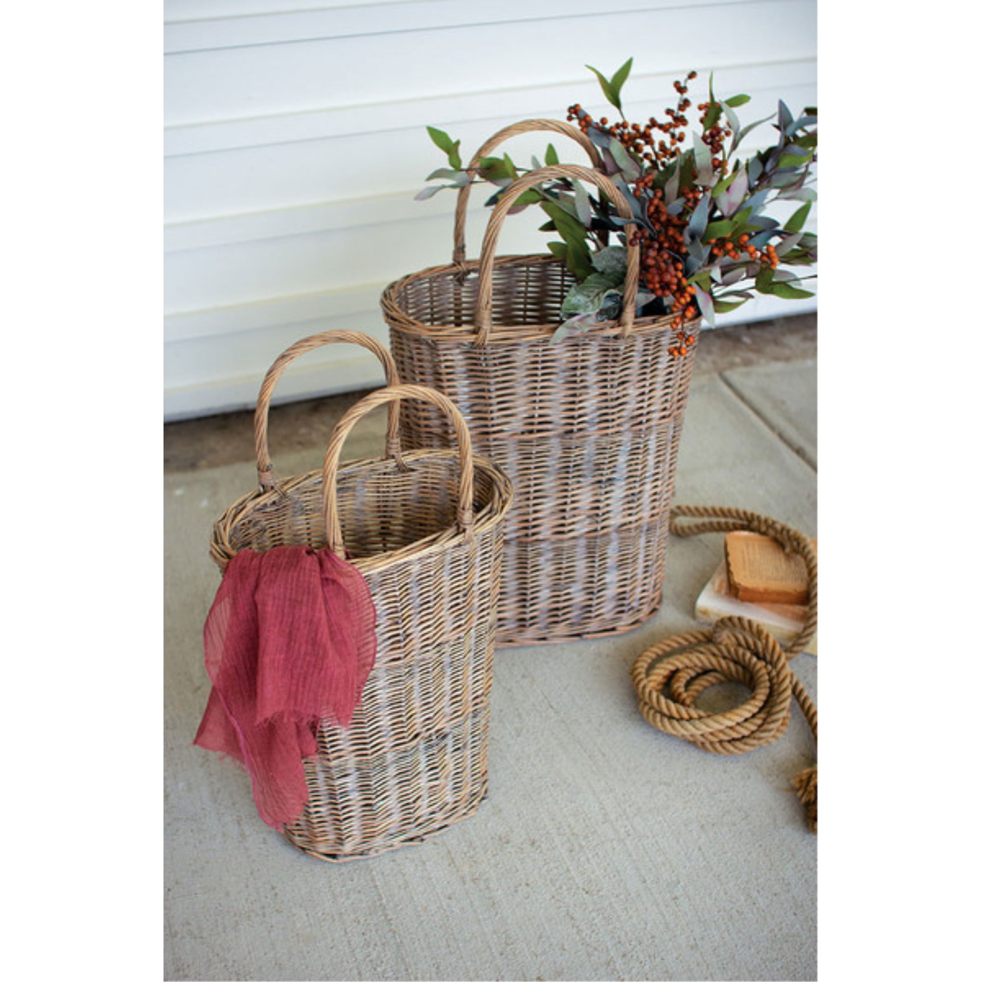 SET OF TWO TALL OVAL WICKER BASKETS