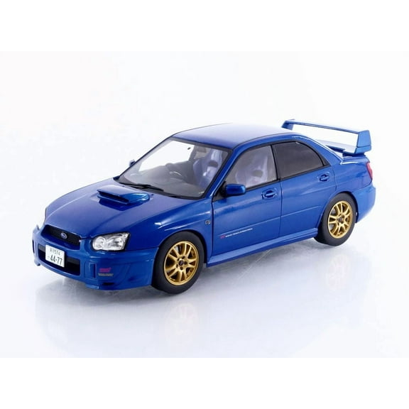 2003 Subaru Impreza WRX STI RHD (Right Hand Drive) Sonic Blue Metallic with Gold Wheels 1/18 Diecast Model Car by Solido