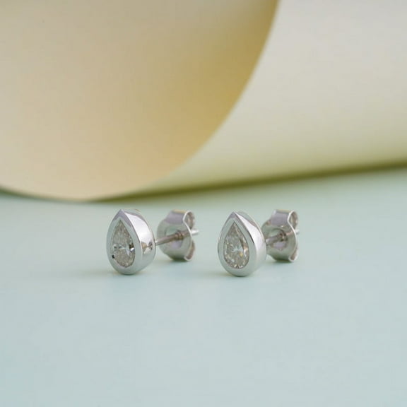 SOLITAIRE JEWELS 1TCW Pear Moissanite/Diamond Pointer Stud Earrings In 925 Silver Sterling