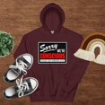 thumbnail image 1 of SORRY-WE’RE-CONSCIOUS Hoodie (Maroon, S), 1 of 1