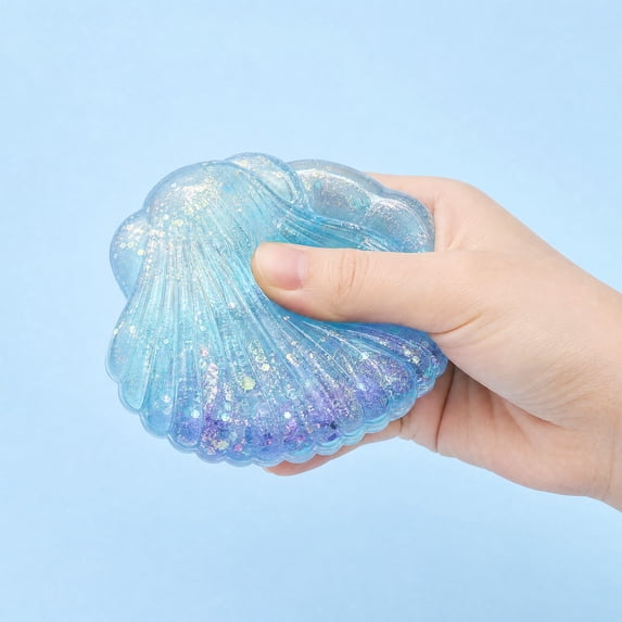 STPToys Transparent Glitter Filled Seashell Shaped Slow Rebound Squeeze Gadget,Blue Soft Pressure Reducing Accessory Perfect For Birthday Gifts, Party Favors And General Reward Presents