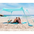 thumbnail image 1 of SUN NINJA 10x10 FT Pop-Up Beach Tent with Sand Shovel, Pegs & Stability Poles – Turquoise Sun Shelter for Beach, Camping & Outdoor Activities, 1 of 8