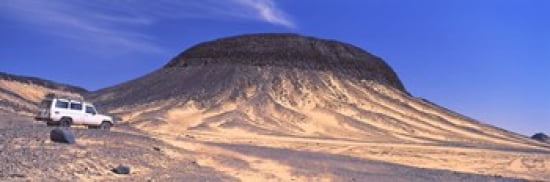 SUV moving in a desert Black Desert Bahariya Oasis Egypt Canvas Art - Panoramic Images (36 x 12)