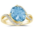 thumbnail image 1 of SZUL Women's Oval Shaped Blue Topaz and Diamond Curve Ring in 10K Yellow Gold, 1 of 3