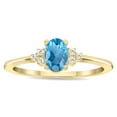 thumbnail image 1 of SZUL Women's Oval Shaped Blue Topaz and Diamond Half Moon Ring in 10K Yellow Gold, 1 of 5