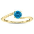thumbnail image 1 of SZUL Women's Round Shaped Solitaire Blue Topaz Wave Ring in 10K Yellow Gold, 1 of 5