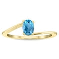 thumbnail image 1 of SZUL Women's Solitaire Oval Shaped Blue Topaz Wave Ring in 10K Yellow Gold, 1 of 5