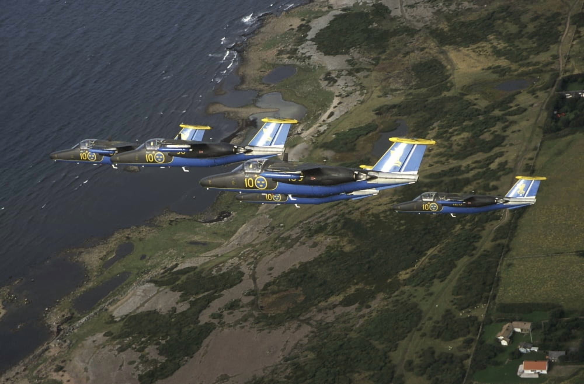 Saab 105 jet trainers of the Swedish Air Force display team Team 60 Canvas Art - Daniel KarlssonStocktrek Images (35 x 23)