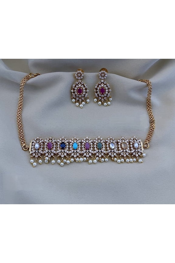 Sabyasachi-Inspired Gold Finish Choker Set with Pearls, American Diamond Stones, Ruby Red & Emerald Green Jhumka Earrings South Indian Bridal Jewelry