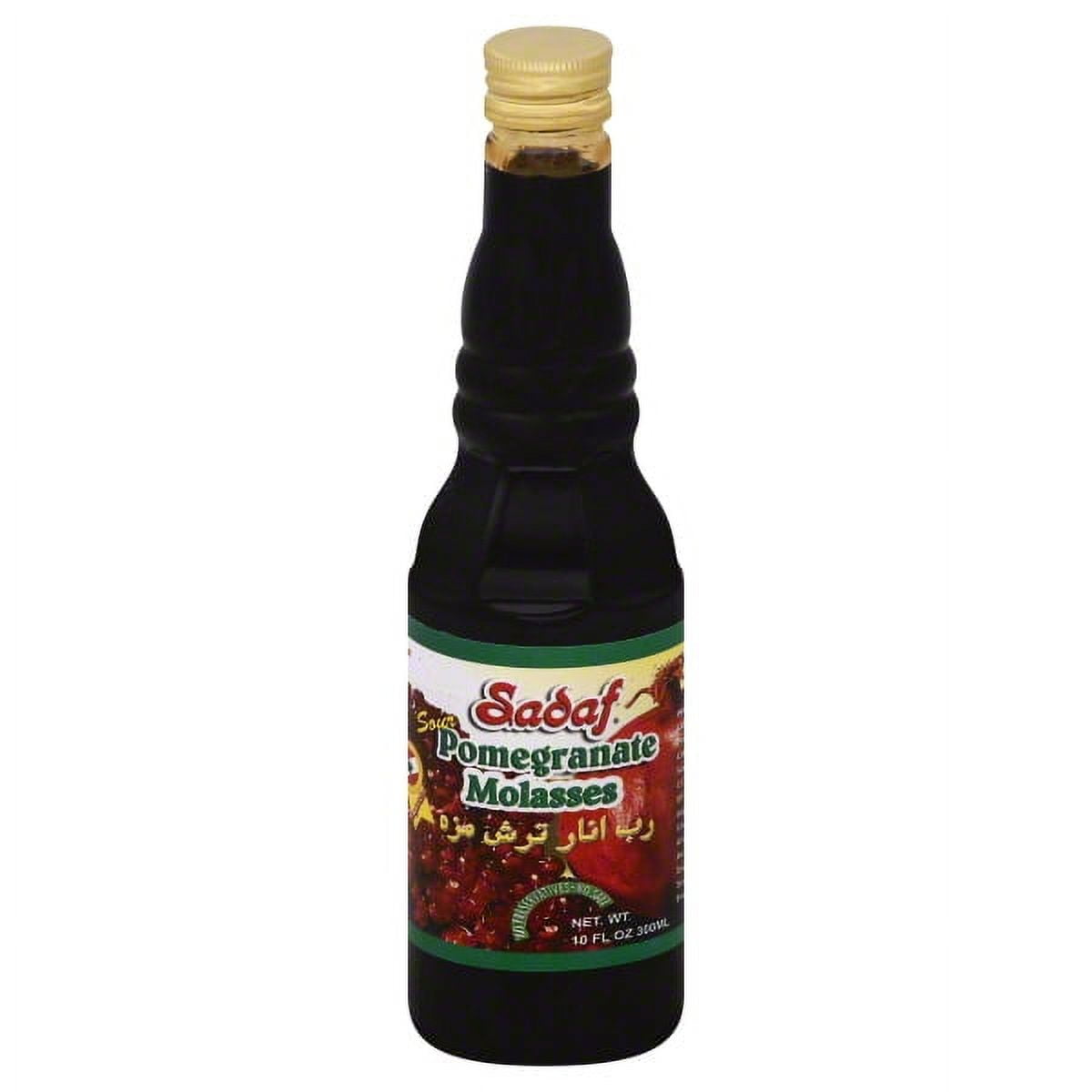 Sadaf brand Pomegranate Molasses, 10 Fl oz. in a bottle