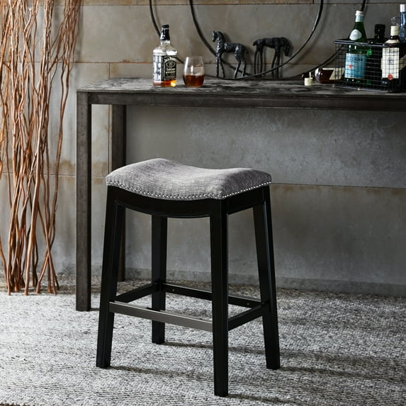 Saddle Counter Stool With Intriguing Antique Bronze Nail Head Embellishment, Metal Kick Plate, High Density Foam Cushion, Dark Birch Legs In Padding Seat