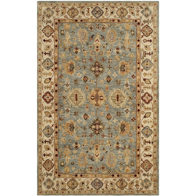 SAFAVIEH Antiquity Langston Oriental Wool Area Rug, Blue/Ivory, 4' x 6'