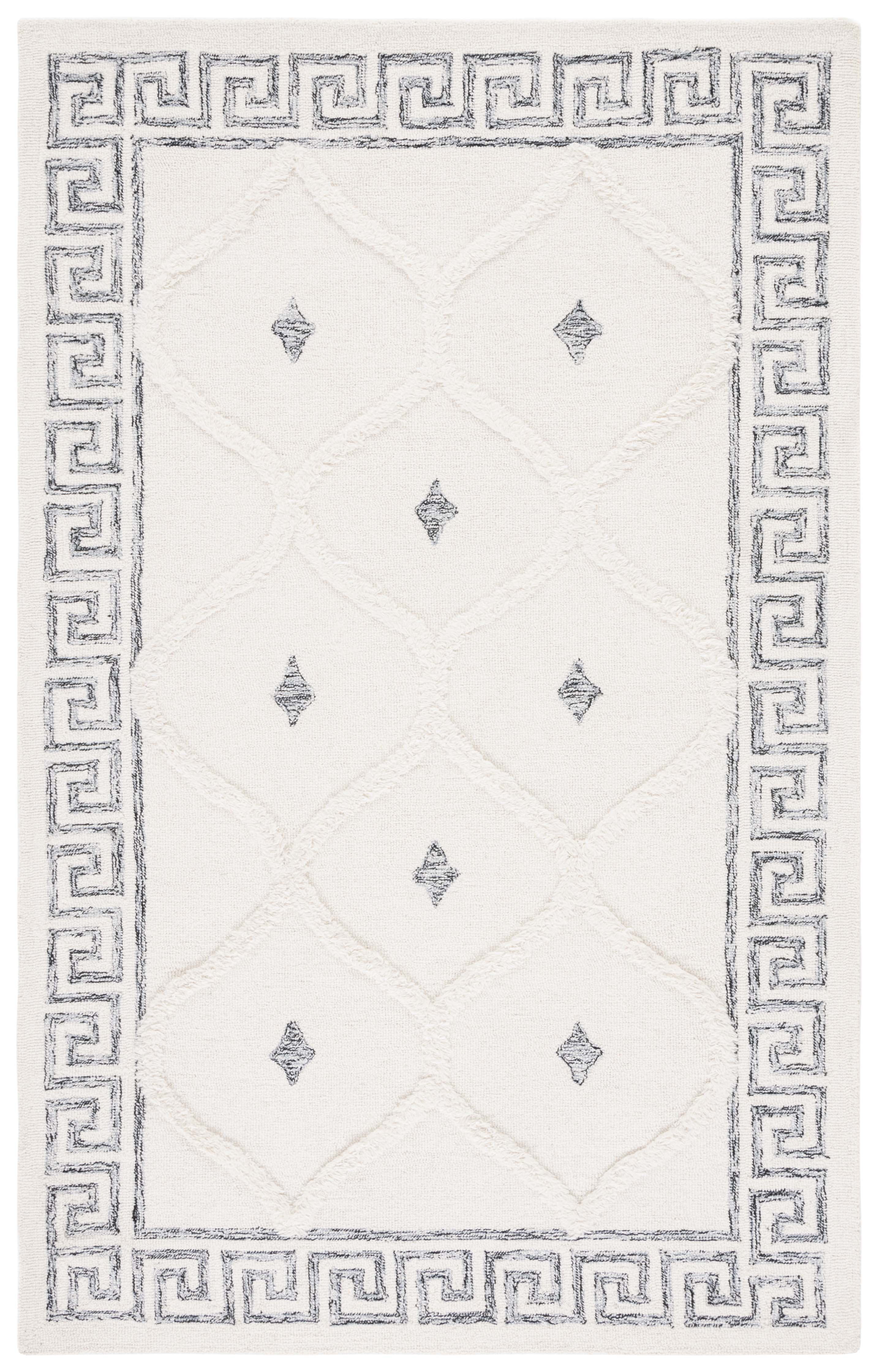 Ivory and Black 5' x 8' Hand Tufted Wool Shag Rug