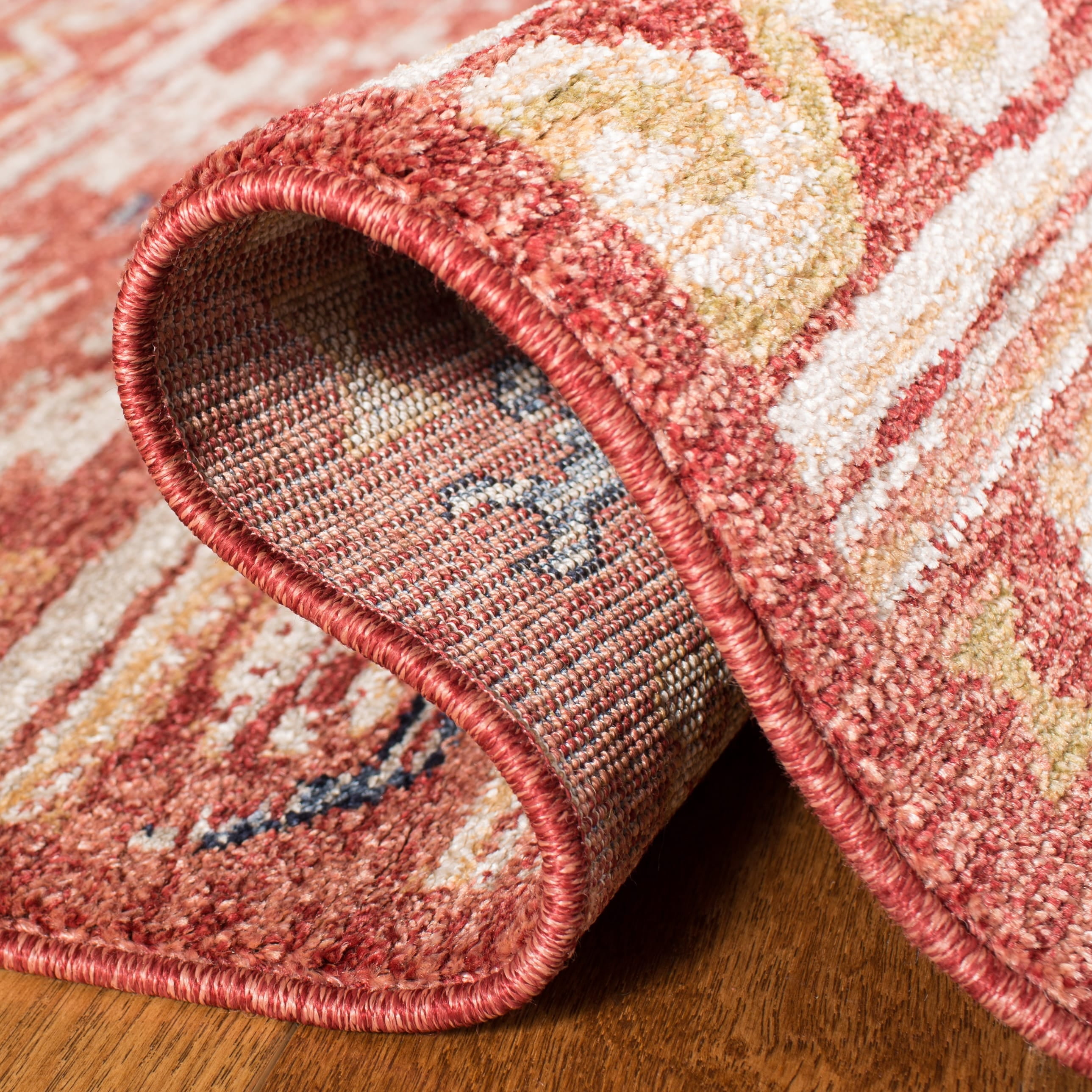 Rust and Ivory Synthetic 9' x 12' Stain-Resistant Area Rug