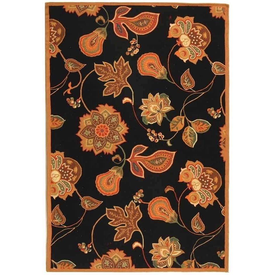Handmade Black and Orange Floral Wool Area Rug