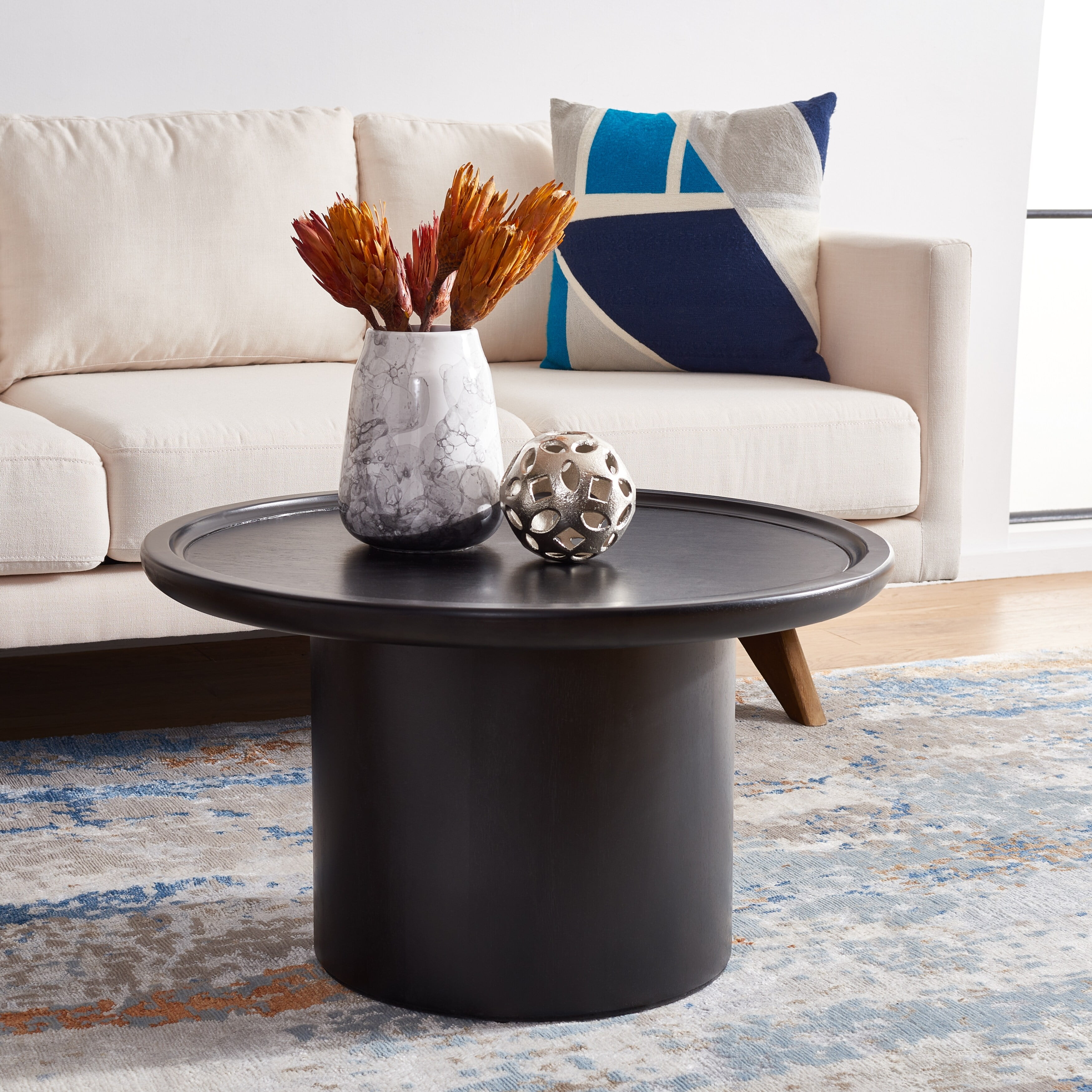 Safavieh Devin Round Pedestal Coffee Table Natural. Black / White