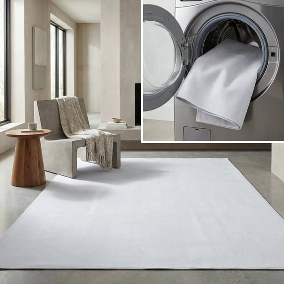 Safavieh Faux Rabbit Fur Machine Washable Slip Resistant Nanami Rug 6' x 9' - Silver