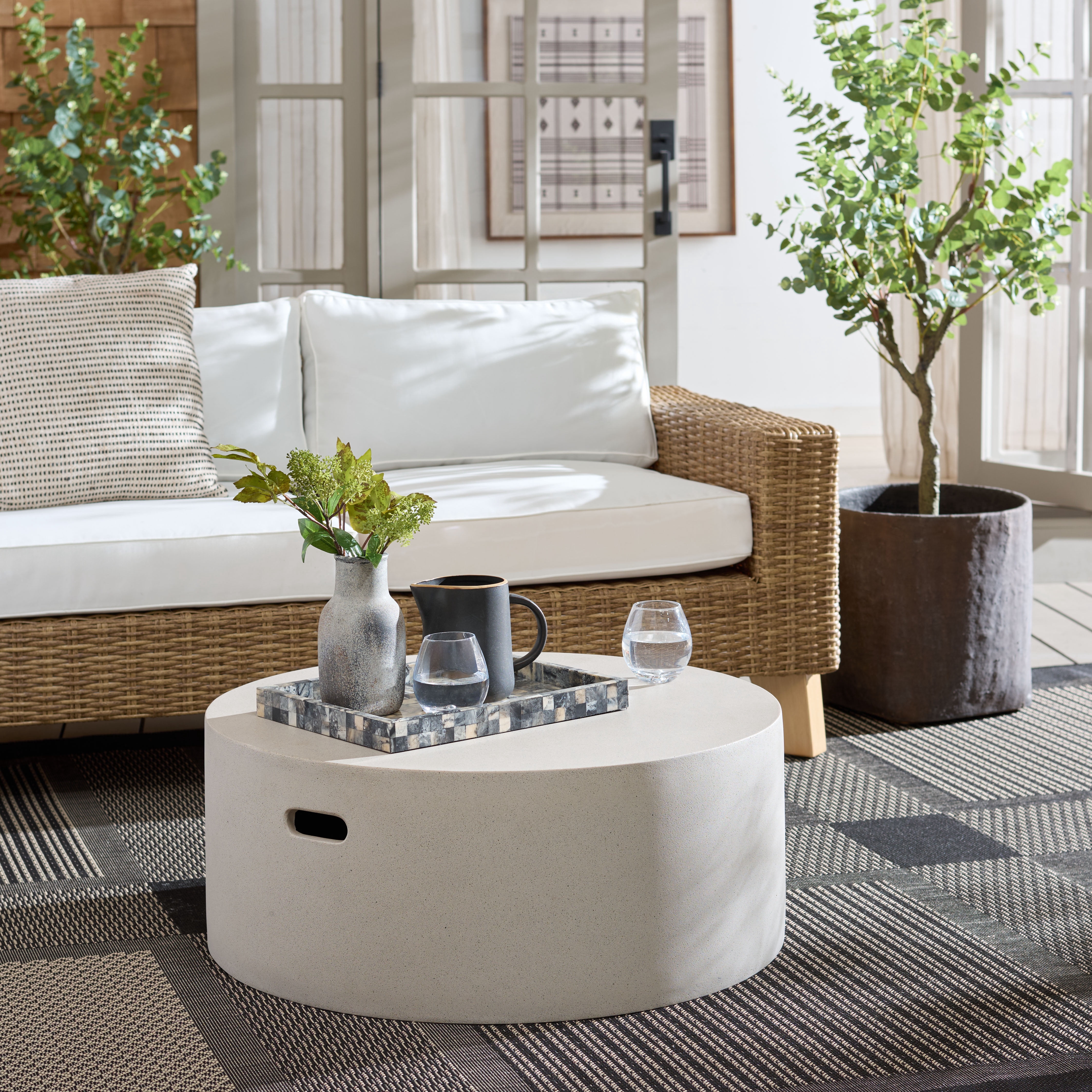 Safavieh Georgia Outdoor Modern Round Polyfiber Coffee Table, Beige