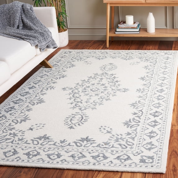 Safavieh Handmade Ebony Iustina Modern Wool Rug 6' x 9' - Ivory/Grey