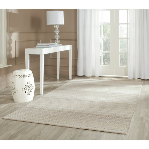 SAFAVIEH Himalaya Whitaker Solid Wool Area Rug, Beige, 5' x 8'