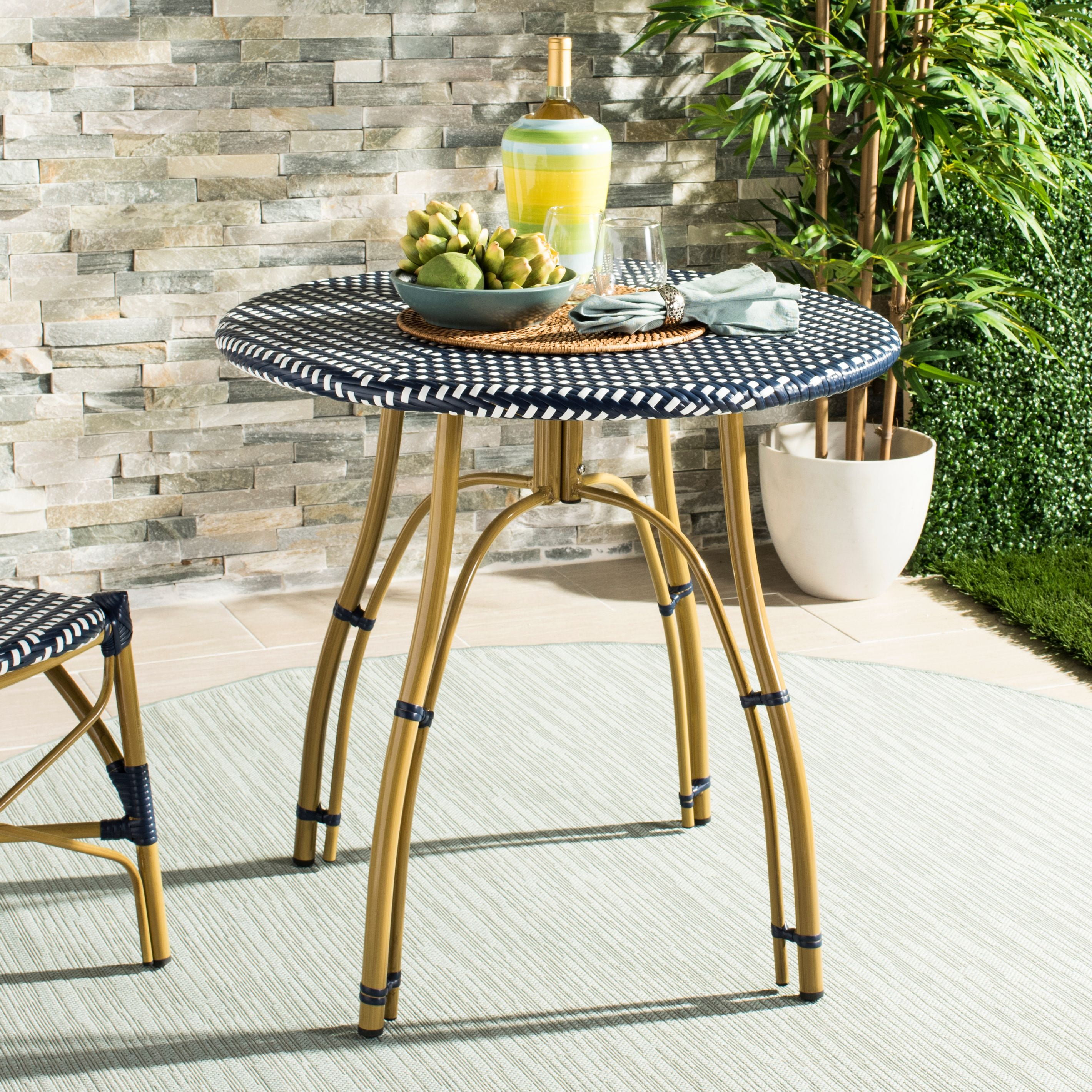 Safavieh rattan table deals