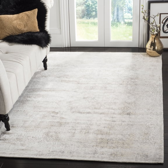 Safavieh Mirage Jaymz Bordered Area Rug, Ivory/Silver, 9' x 12'
