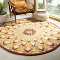 thumbnail image 1 of Safavieh Novelty 5' Round Hand Tufted Wool Rug in Rust and Gold, 1 of 6