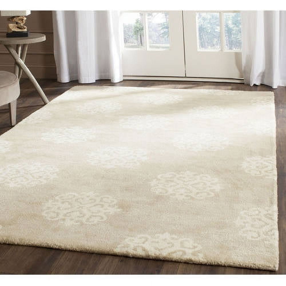 Beige and Ivory 6' x 9' Hand-Tufted Wool and Viscose Area Rug