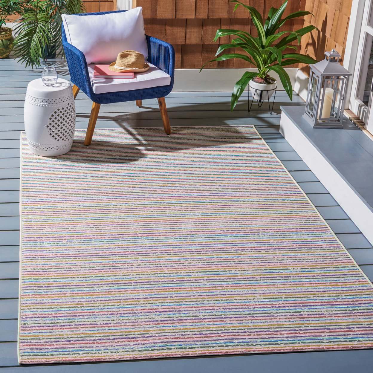 Ivory and Blue Synthetic 4' x 6' Easy-Care Outdoor Rug