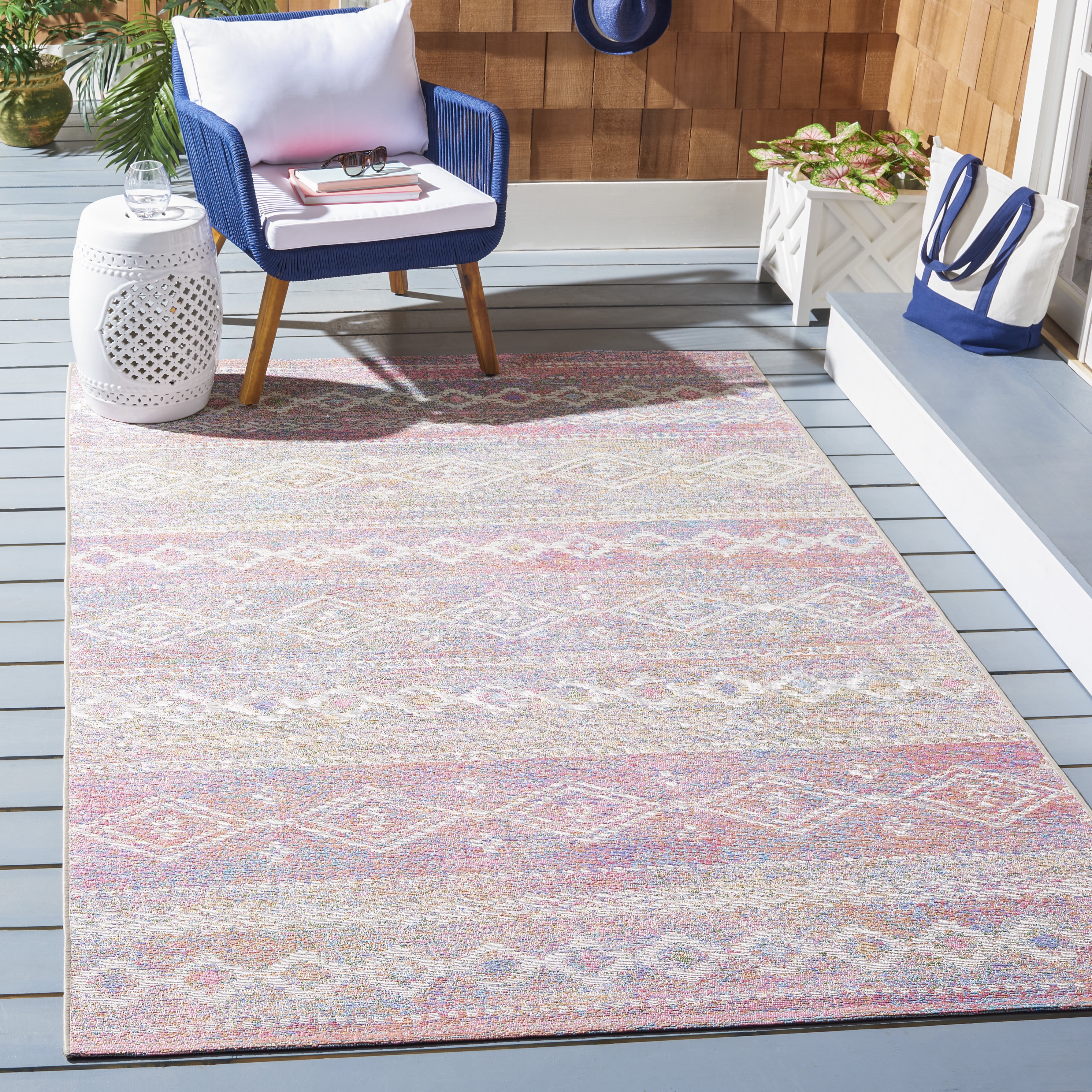 Ivory and Pink Synthetic Flat Woven Outdoor Rug