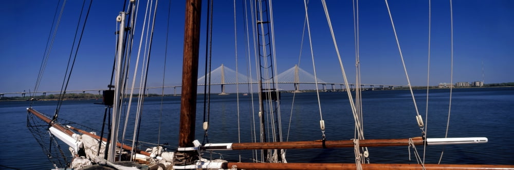 Sailing ship with bridge in the background Charleston South Carolina USA Canvas Art - Panoramic Images (27 x 9)