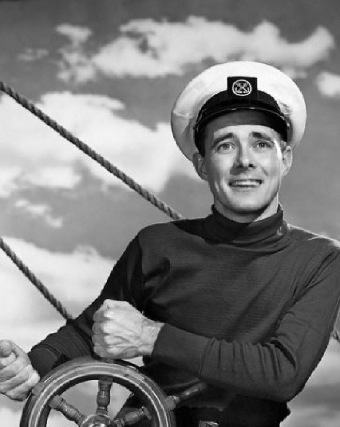 Sailor steering boat and smiling Canvas Art - (18 x 24)