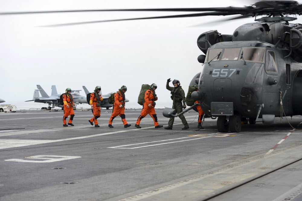 Sailors board an MH-53E Sea Dragon aboard USS George HW Bush Canvas Art - Stocktrek Images (35 x 23)