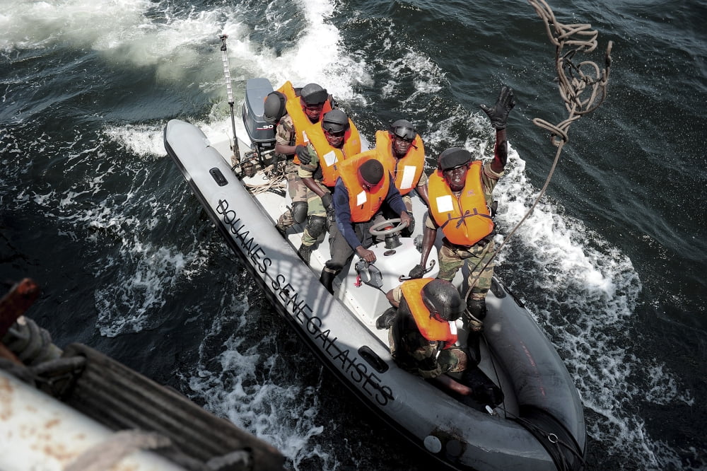 Sailors from the Senegalese navy prepare to board a Spanish navy offshore patrol vessel Canvas Art - Stocktrek Images (35 x 24)