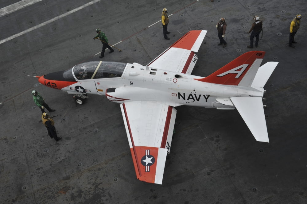Sailors perform pre-flight checks on a T-45C Goshawk Canvas Art - Stocktrek Images (35 x 23)