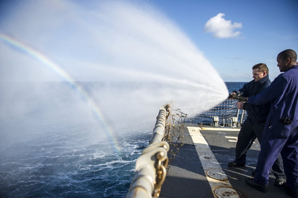 Sailors practice fire fighting techniques aboard USS Roosevelt Canvas Art - Stocktrek Images (34 x 23)