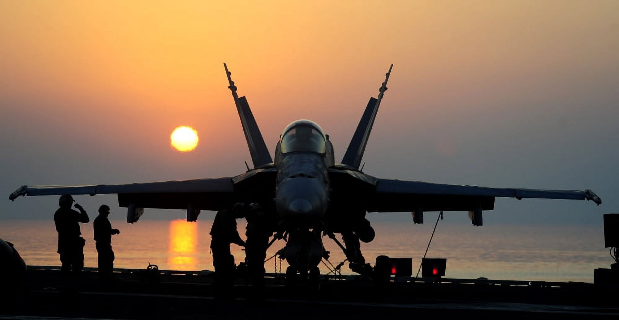 Sailors prepare an FA-18C Hornet for flight operations aboard USS John C Stennis Canvas Art - Stocktrek Images (40 x 21)