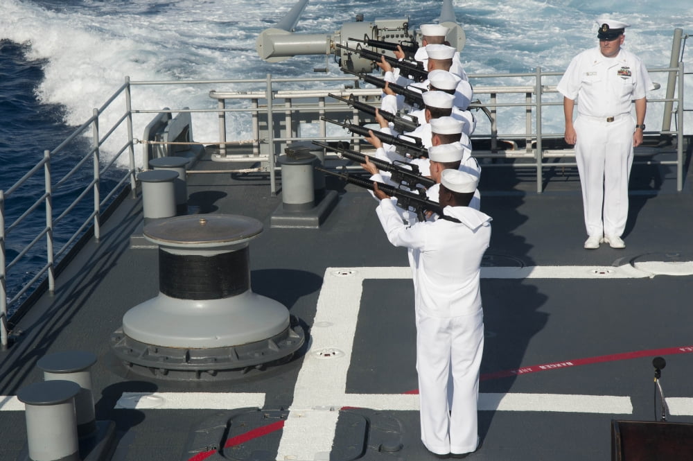 Sailors render a rifle volley aboard USS Hue City Canvas Art - Stocktrek Images (35 x 23)