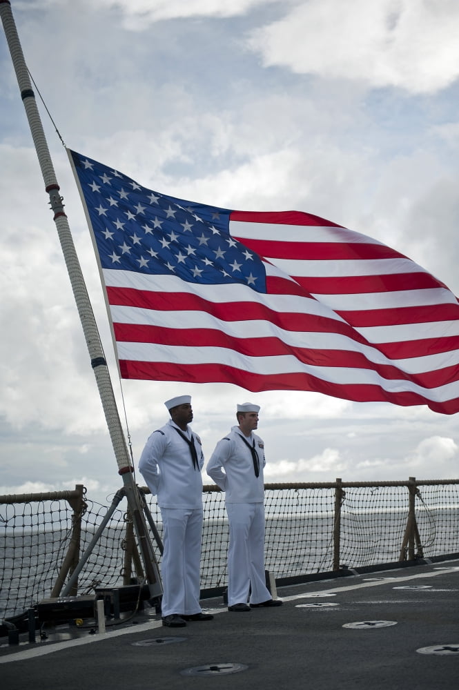 Sailors stand at parade rest during a remembrance ceremony aboard USS Pearl Harbor Canvas Art - Stocktrek Images (23 x 35)